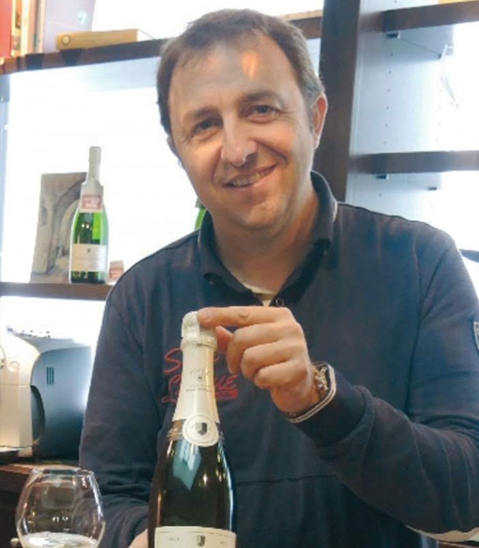 Local winemaker meeting guests on a private Champagne tour from Paris